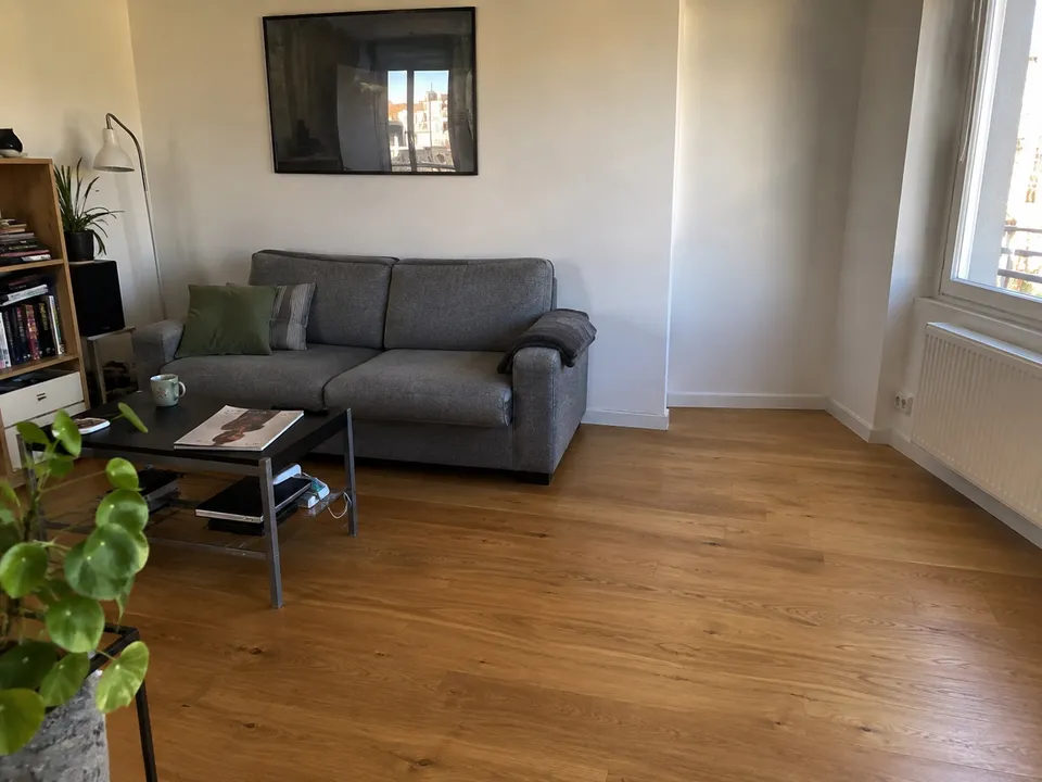 Living room with space beside the sofa